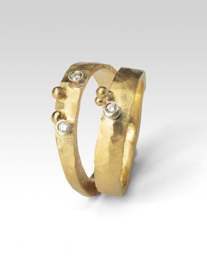 Hammered duet ring with diamonds Contemporary Diamond