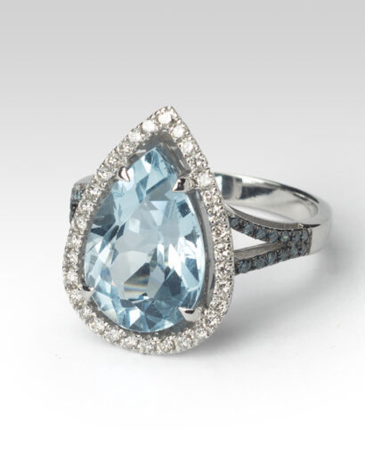 Blue pear shape topaz and diamond ring Contemporary Diamond